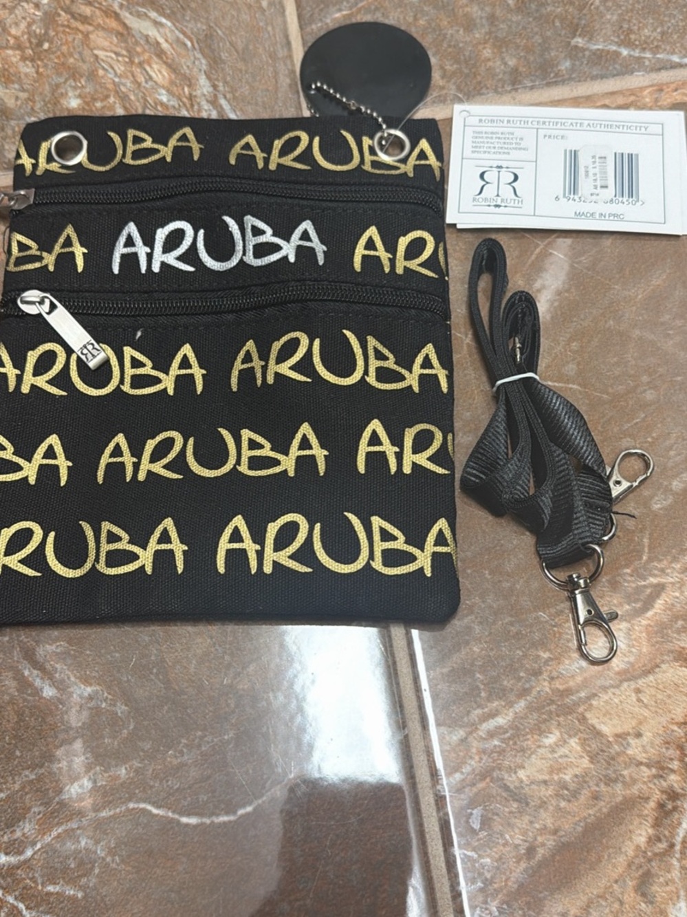 Robin Ruth Black Crossbody Bag with Gold and White Aruba Script